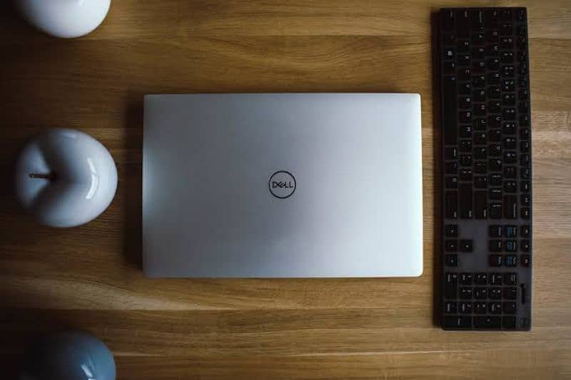 Dell laptop core i7 pin packed good brand new- hp i5	apple