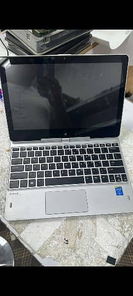 Hp revolve 810 (Touch Laptop) With original Charger