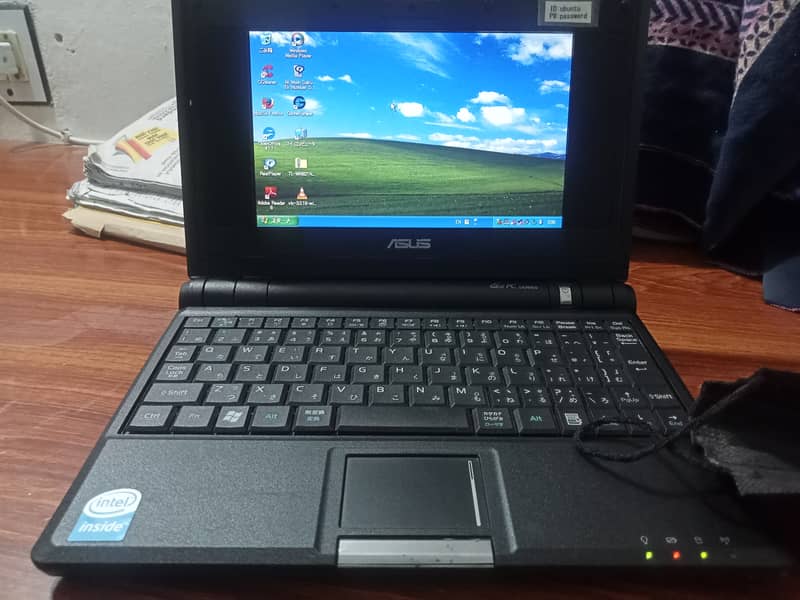 Asus mini laptop built in windows XP in new condition