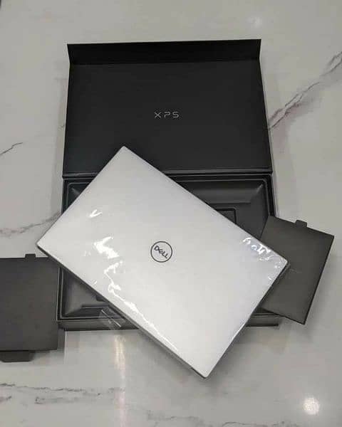 Dell laptop core i7 warranty 2 yers- nice Full ok i5 - apple + i3