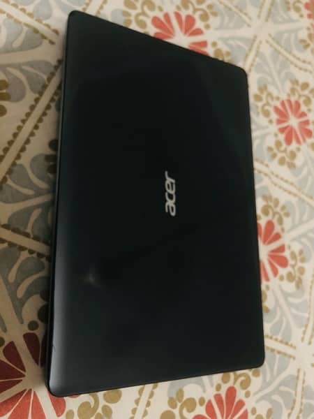 Acer E1-571