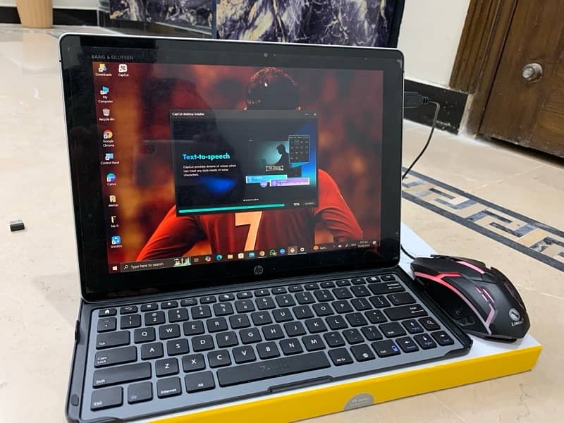 HP Elitebook X2 ( With free wireless keyboard and mouse )